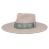 Ninakuru wool hat with brocade ribbon.